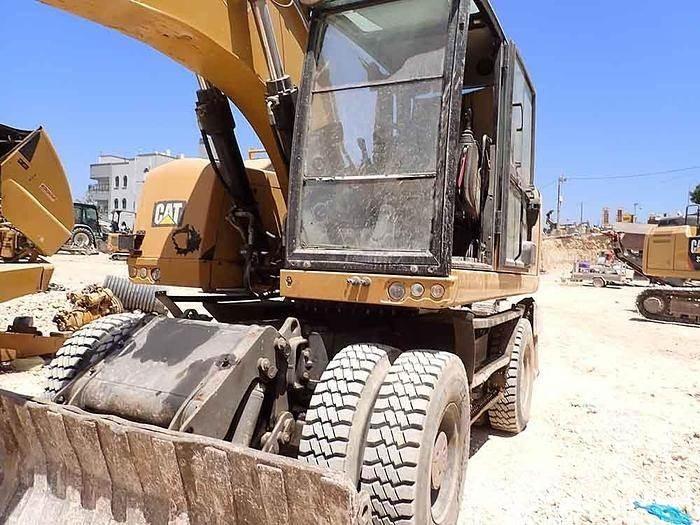 CAT M320F Speciális kotrók