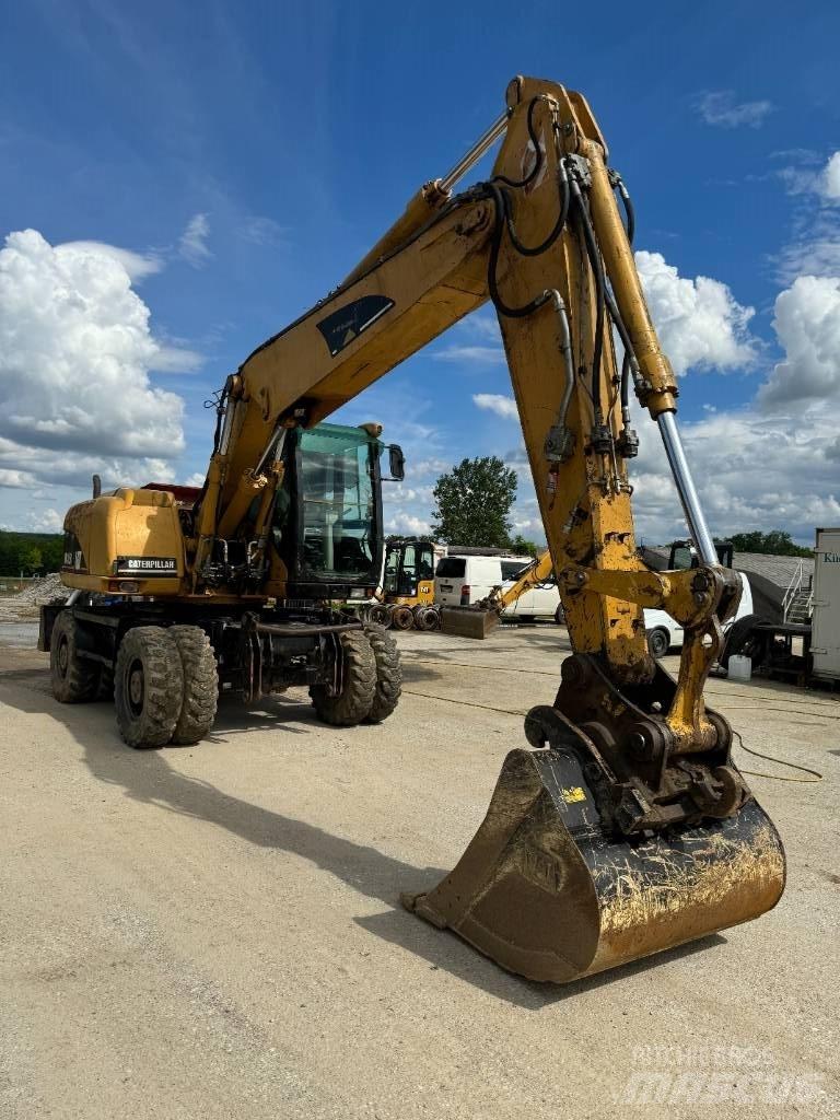CAT 315 C Gumikerekes kotrók