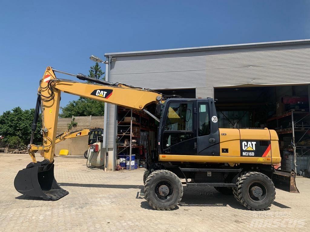 CAT M 316 D Gumikerekes kotrók