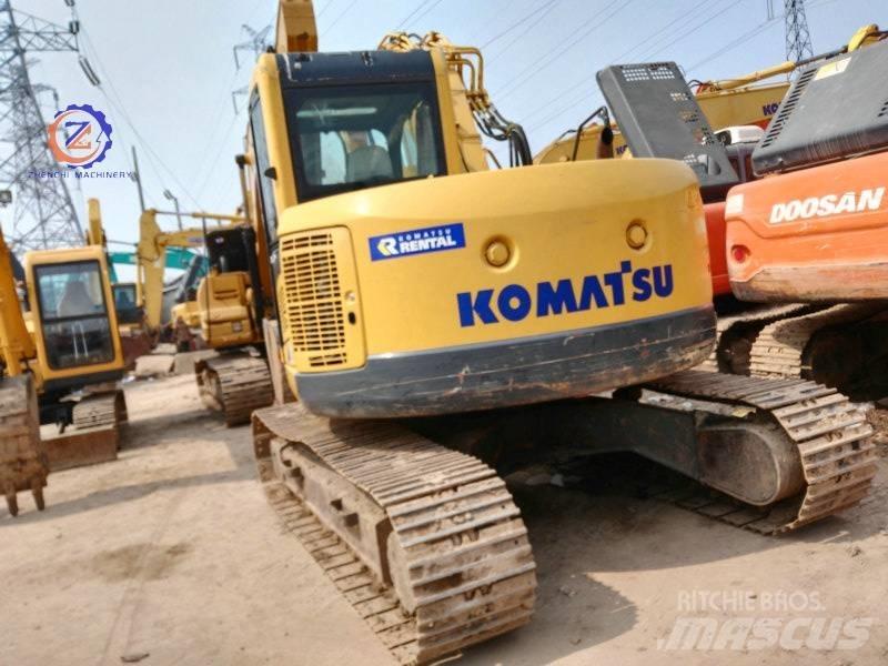 Komatsu PC 128 US Közepes (midi) kotrók 7 t - 12 t