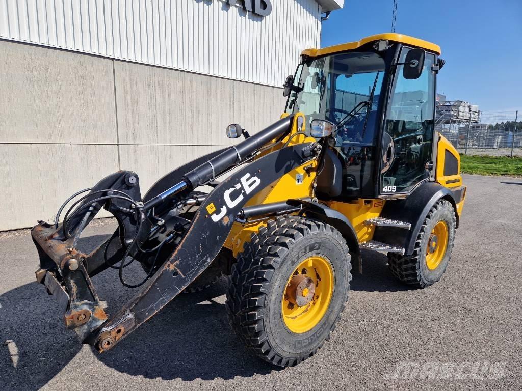 JCB Lastmaskin  409 Gumikerekes homlokrakodók