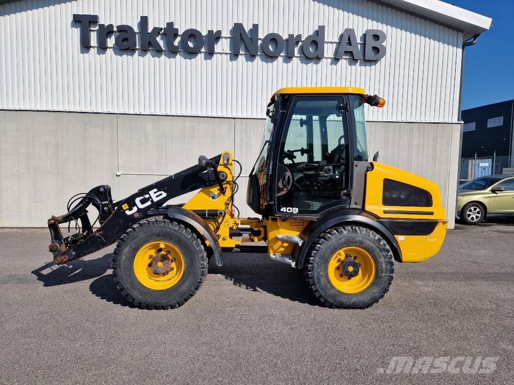 JCB Lastmaskin  409 Gumikerekes homlokrakodók