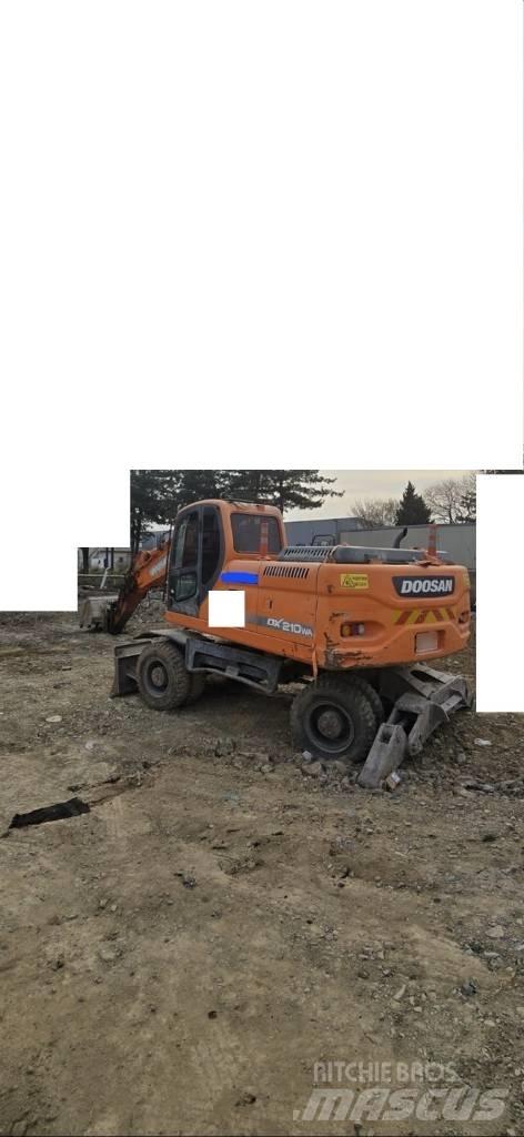 Doosan DX 210 W Gumikerekes kotrók