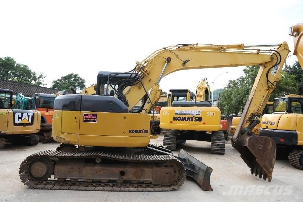 Komatsu PC 128 US Közepes (midi) kotrók 7 t - 12 t