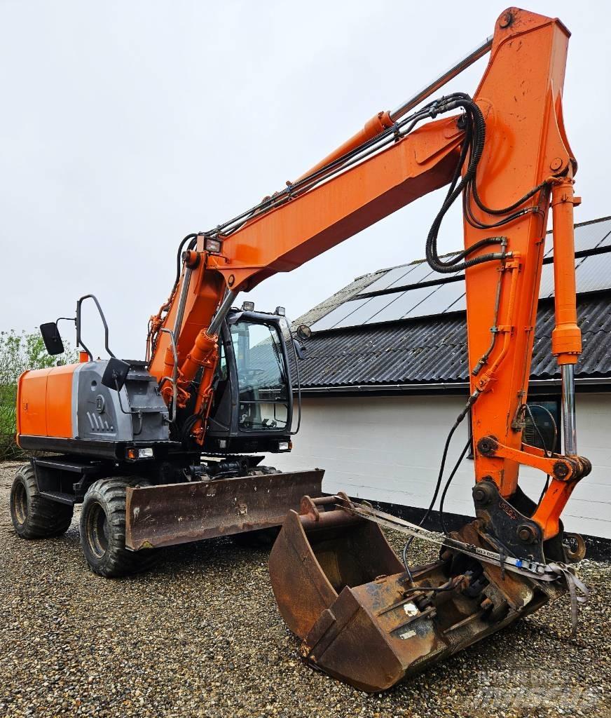 Hitachi ZX 140 W-3 Gumikerekes kotrók