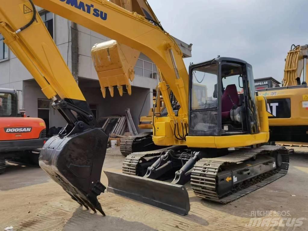 Komatsu PC 128US Közepes (midi) kotrók 7 t - 12 t