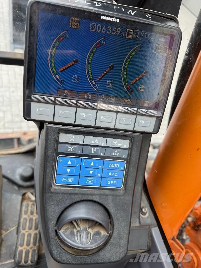 Komatsu PW 148-8 Gumikerekes kotrók