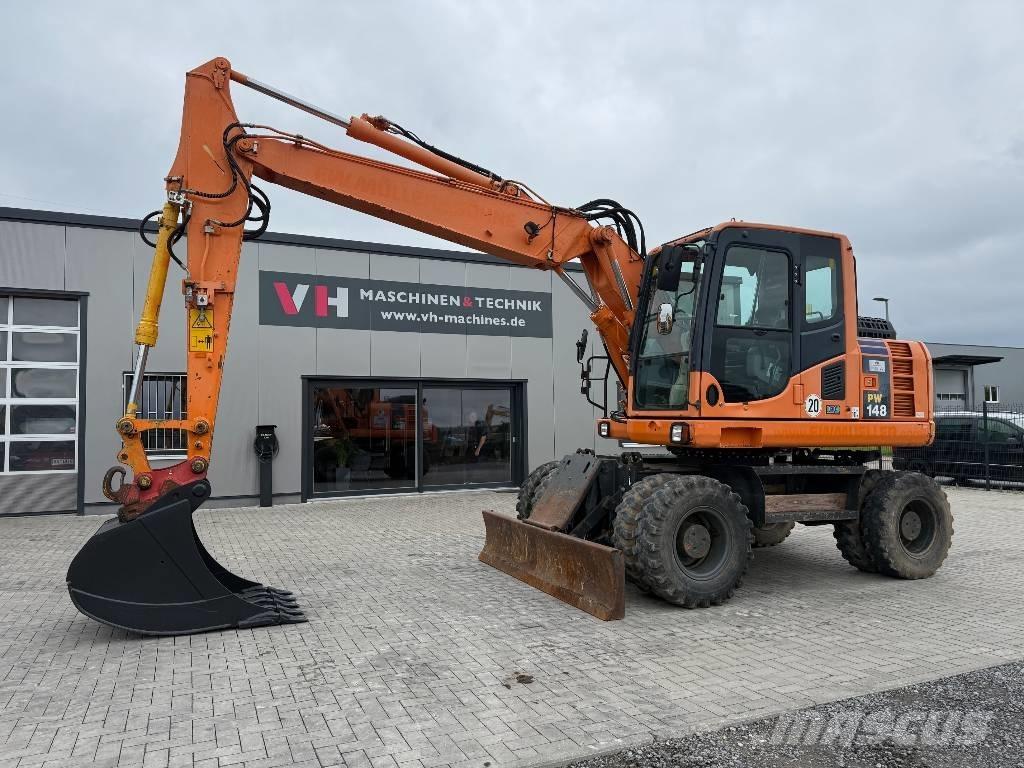 Komatsu PW 148-8 Gumikerekes kotrók