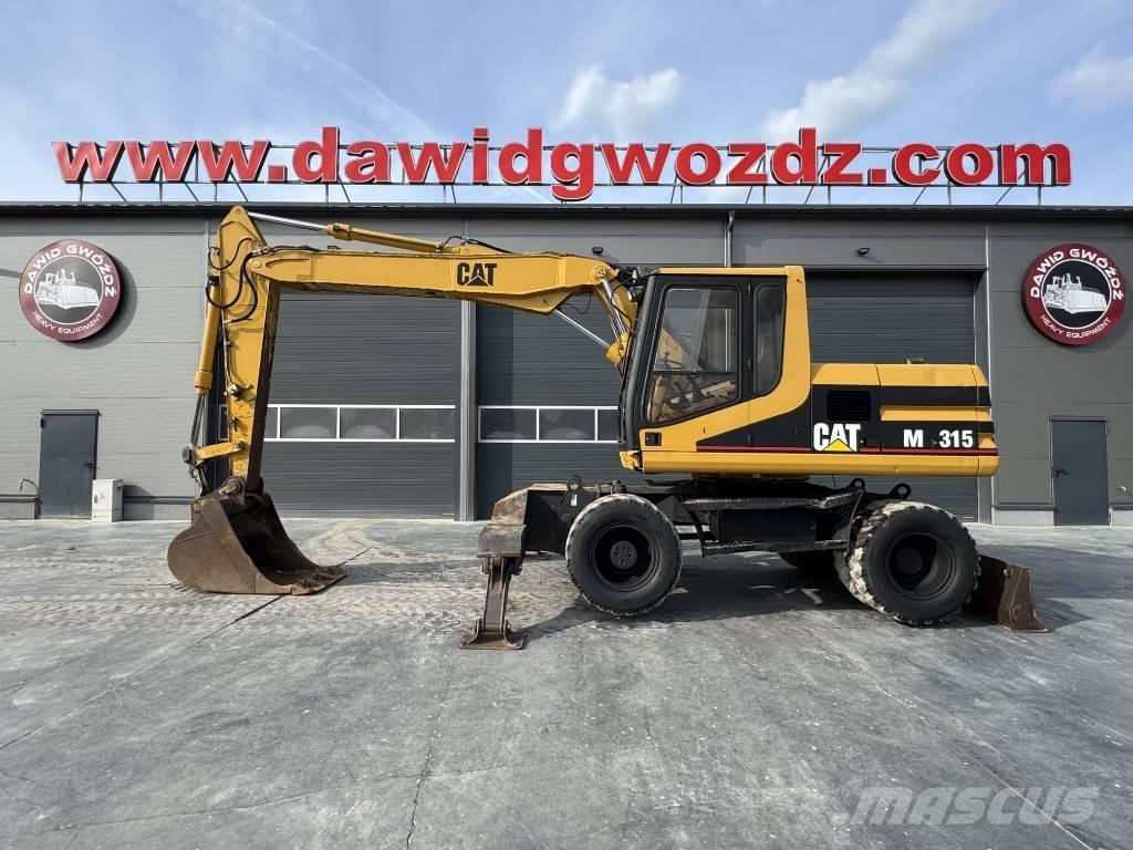 CAT M 315 Gumikerekes kotrók