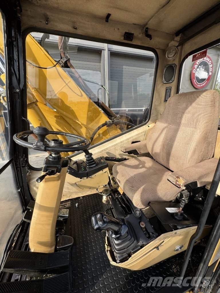 CAT M 315 Gumikerekes kotrók