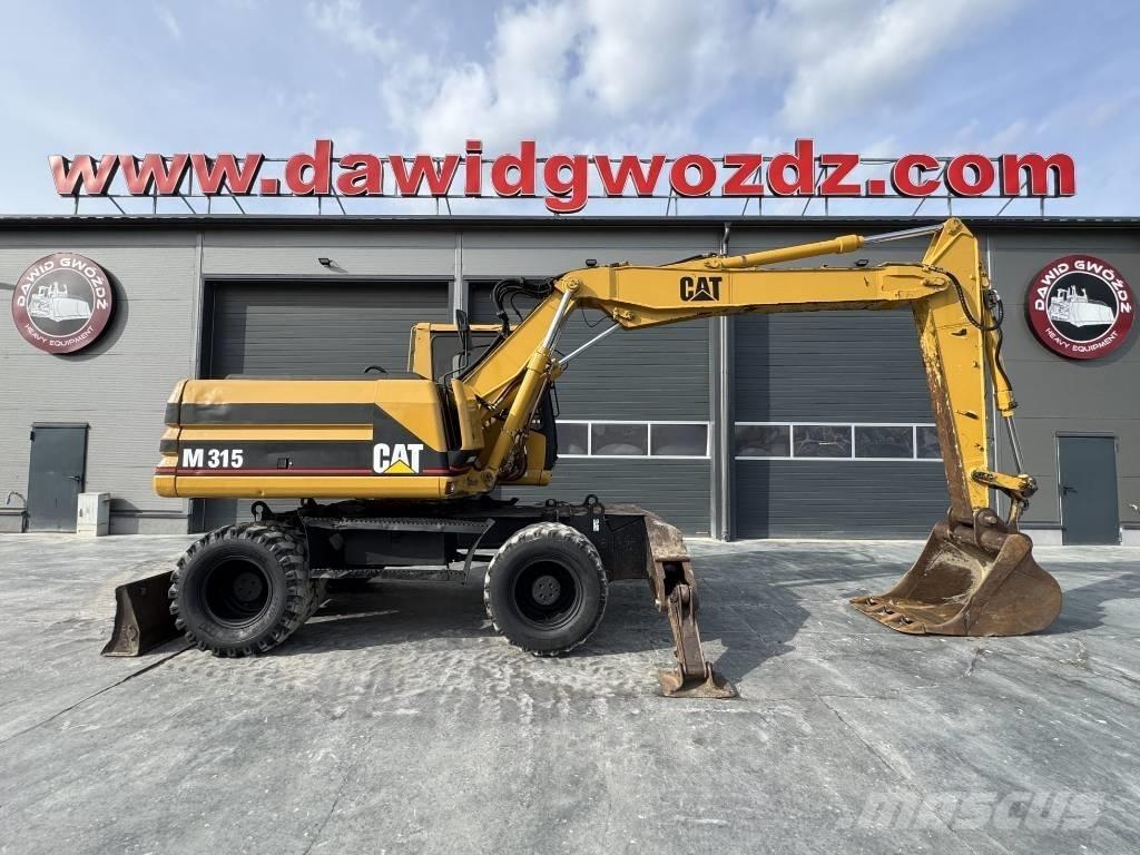 CAT M 315 Gumikerekes kotrók