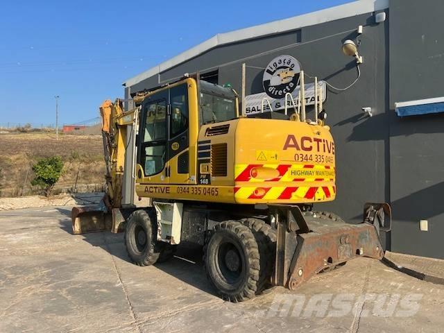 Komatsu PW 148 Gumikerekes kotrók