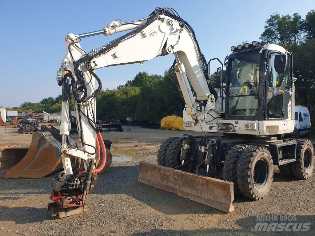 Komatsu PW118MR-11 Gumikerekes kotrók