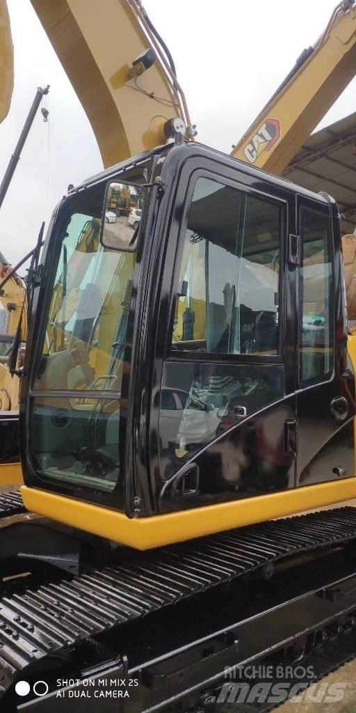 CAT 2021 CAT 313D2GC Gumikerekes kotrók