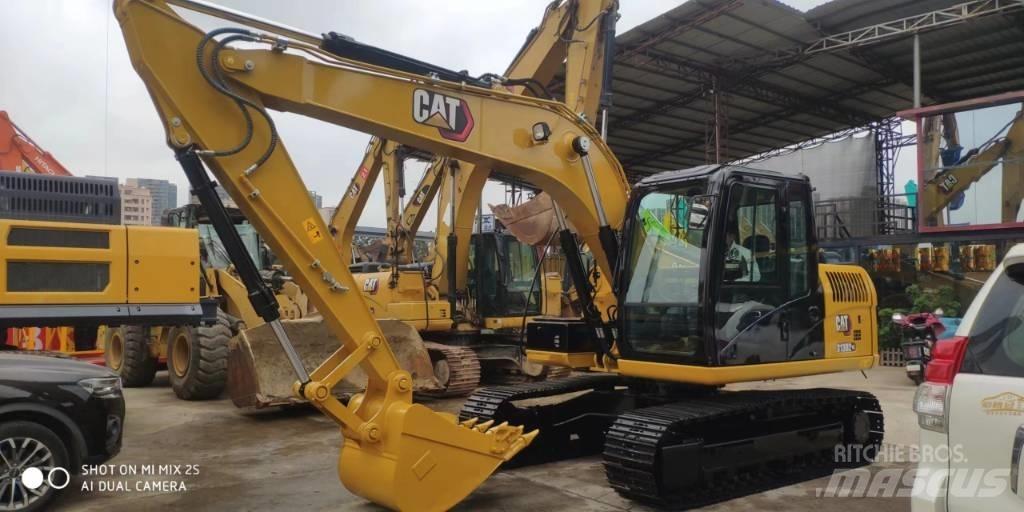 CAT 2021 CAT 313D2GC Gumikerekes kotrók