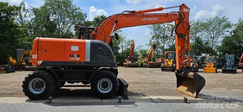 Hitachi ZX140-3 Gumikerekes kotrók