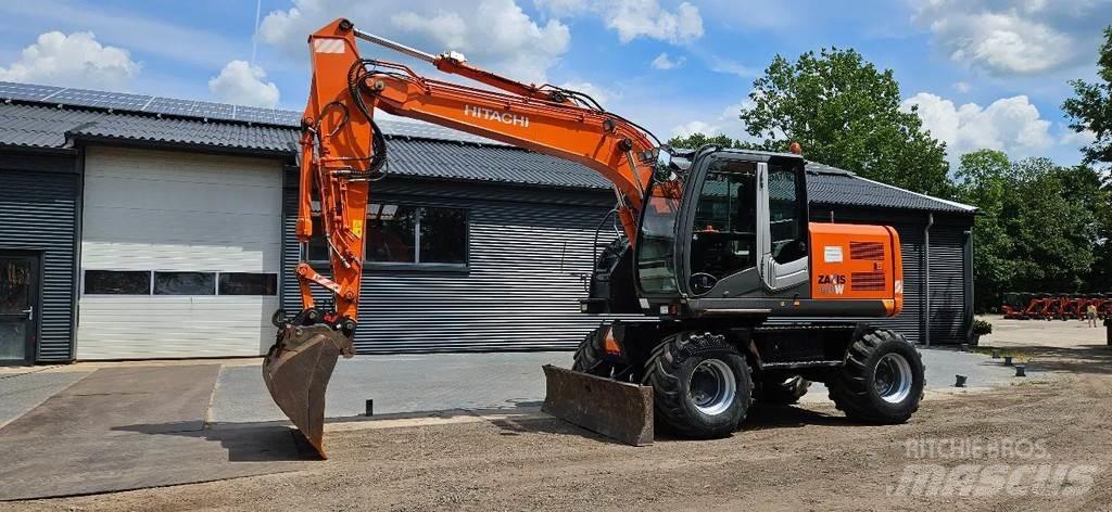 Hitachi ZX140-3 Gumikerekes kotrók