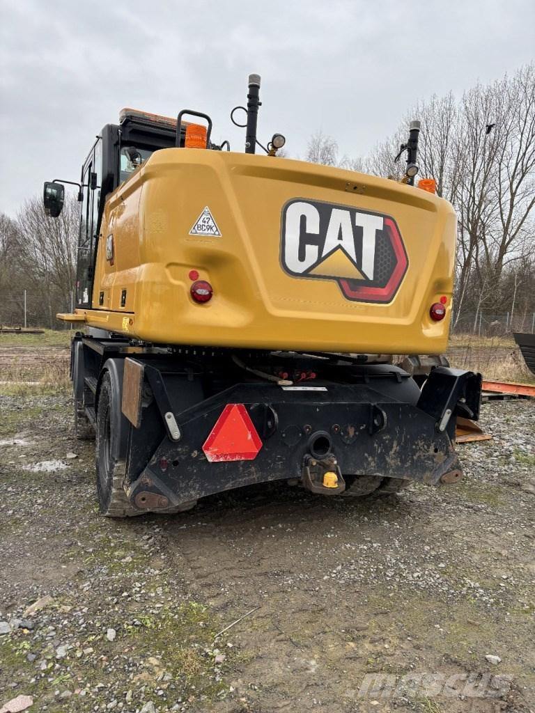 CAT M 318 Gumikerekes kotrók