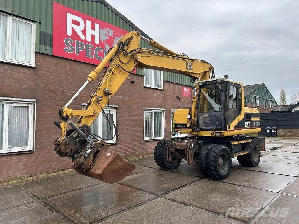 CAT M315 +ROTO CE Gumikerekes kotrók