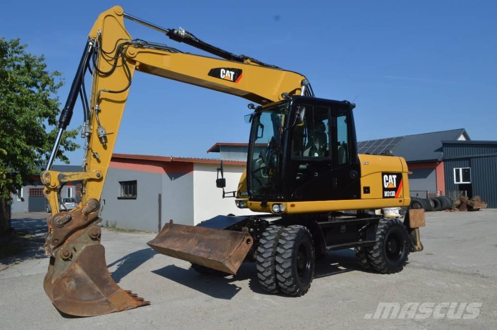 CAT M 313 D Gumikerekes kotrók
