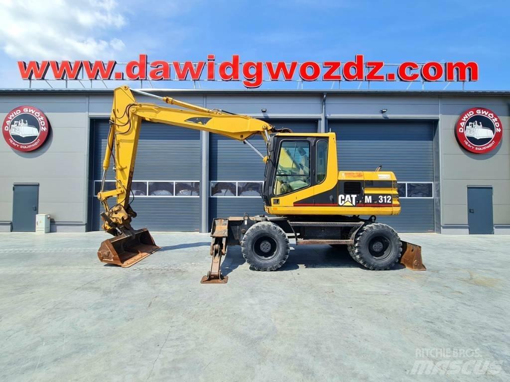 CAT M 312 Gumikerekes kotrók