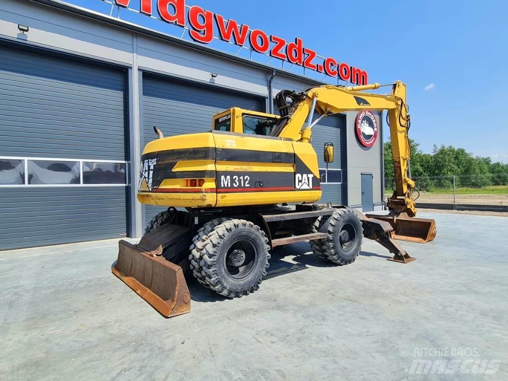 CAT M 312 Gumikerekes kotrók