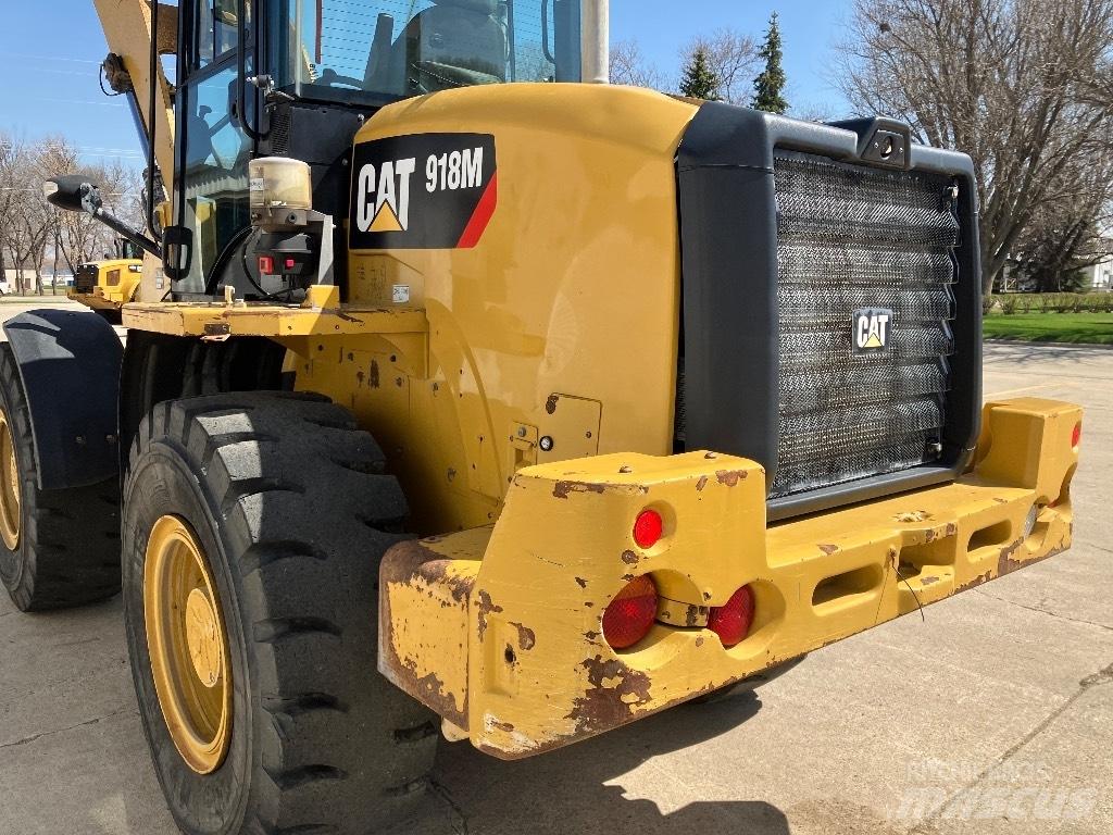 CAT 918 M Gumikerekes homlokrakodók