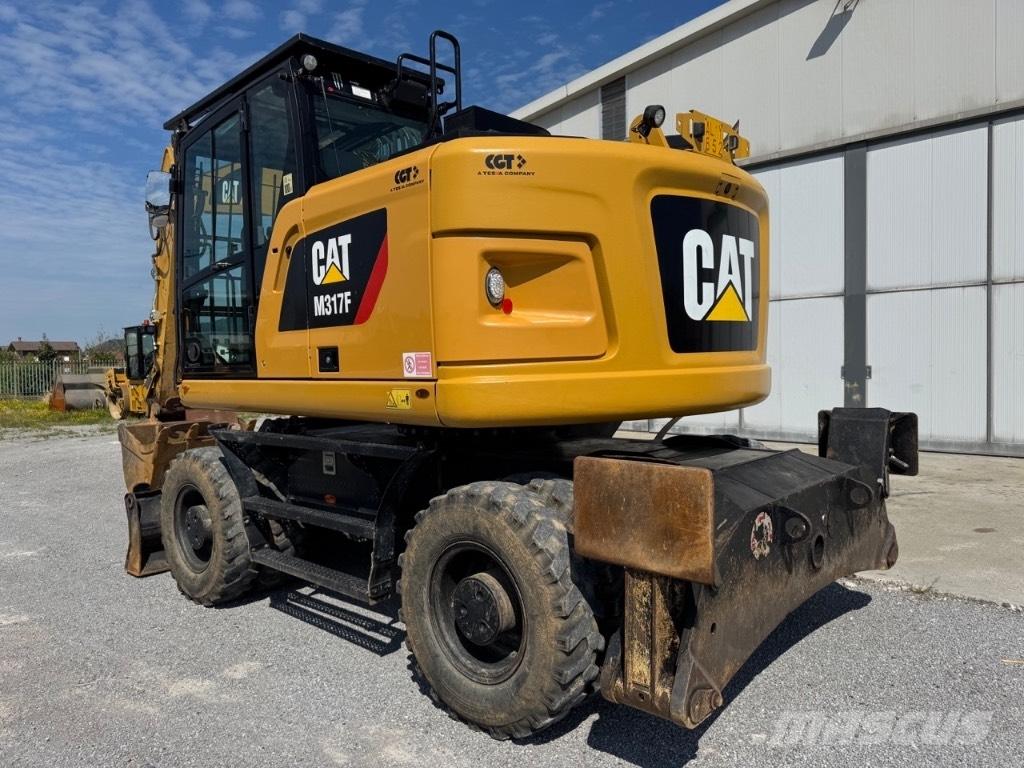 CAT M317F Gumikerekes kotrók