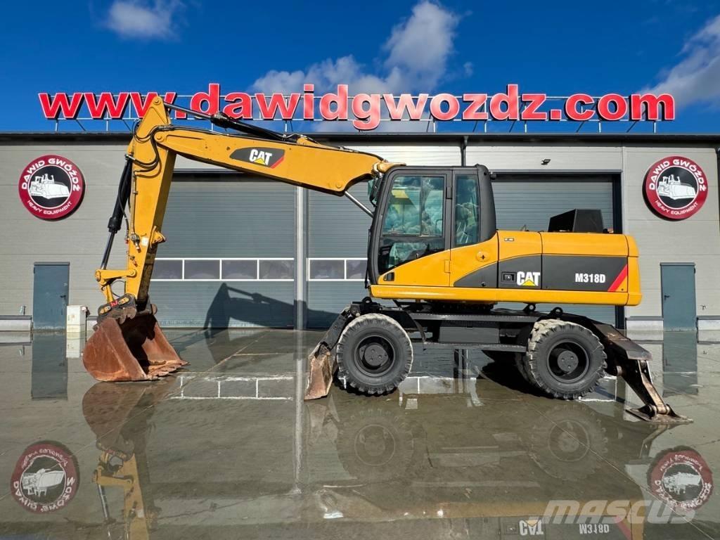 CAT M 318 D Gumikerekes kotrók