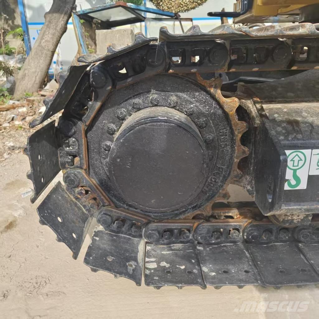 CAT 310 Lánctalpas kotrók