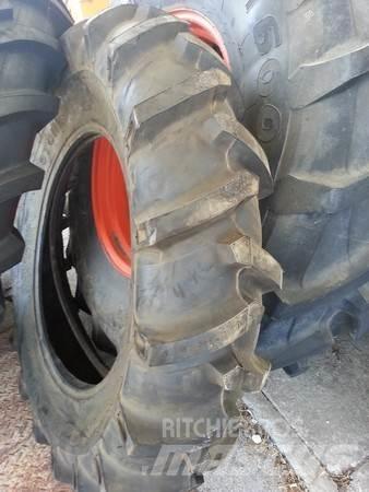  Pneu 13.6-28 Gumiabroncsok, kerekek és felnik