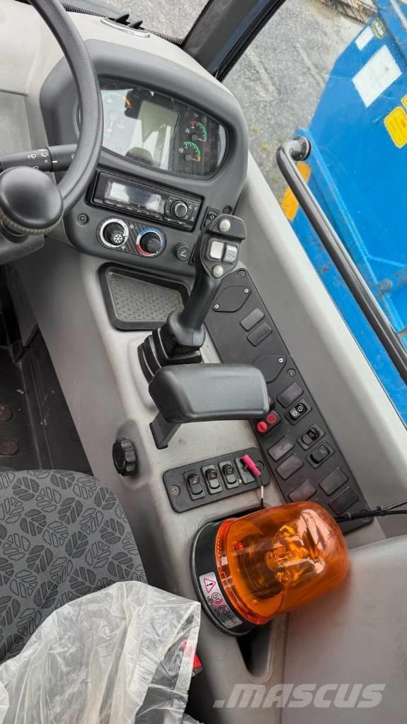 New Holland W70C Gumikerekes homlokrakodók