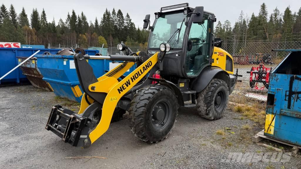 New Holland W70C Gumikerekes homlokrakodók