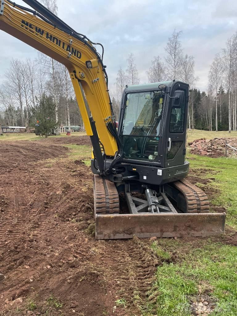 New Holland E60C Mini kotrók < 7t