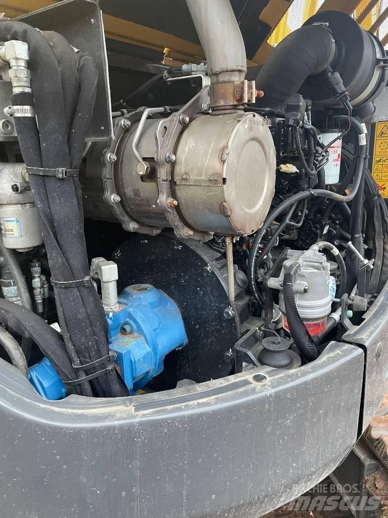 New Holland E60C Mini kotrók < 7t