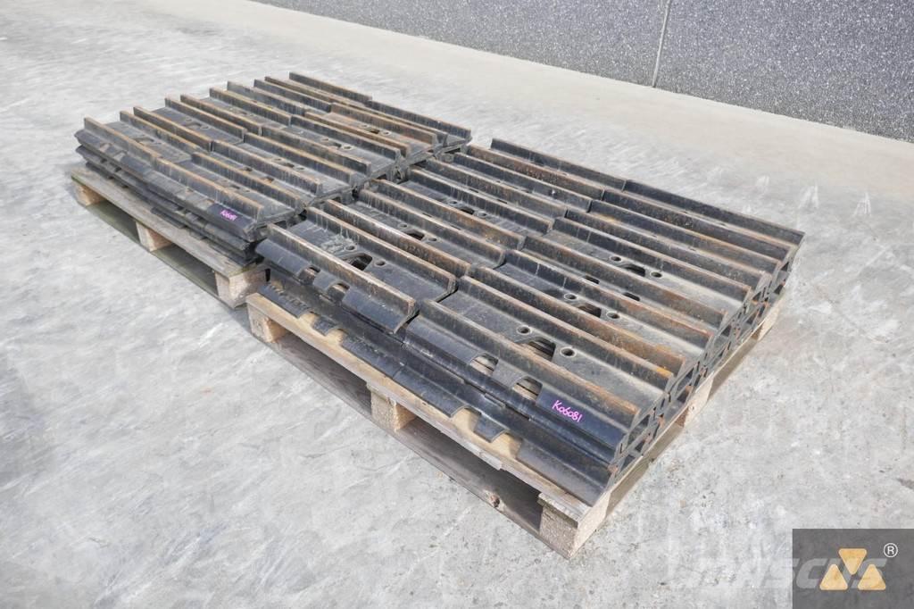 CAT 330 Trackshoes Gumiabroncsok, kerekek és felnik