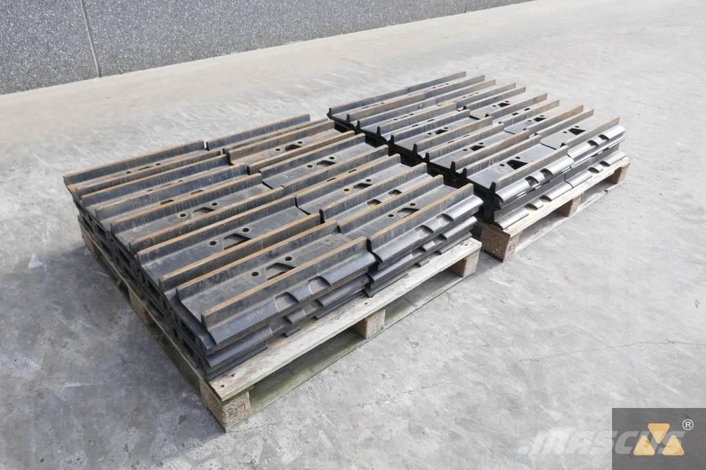 CAT 330 Trackshoes Gumiabroncsok, kerekek és felnik