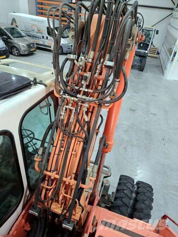Atlas 1404 Gumikerekes kotrók