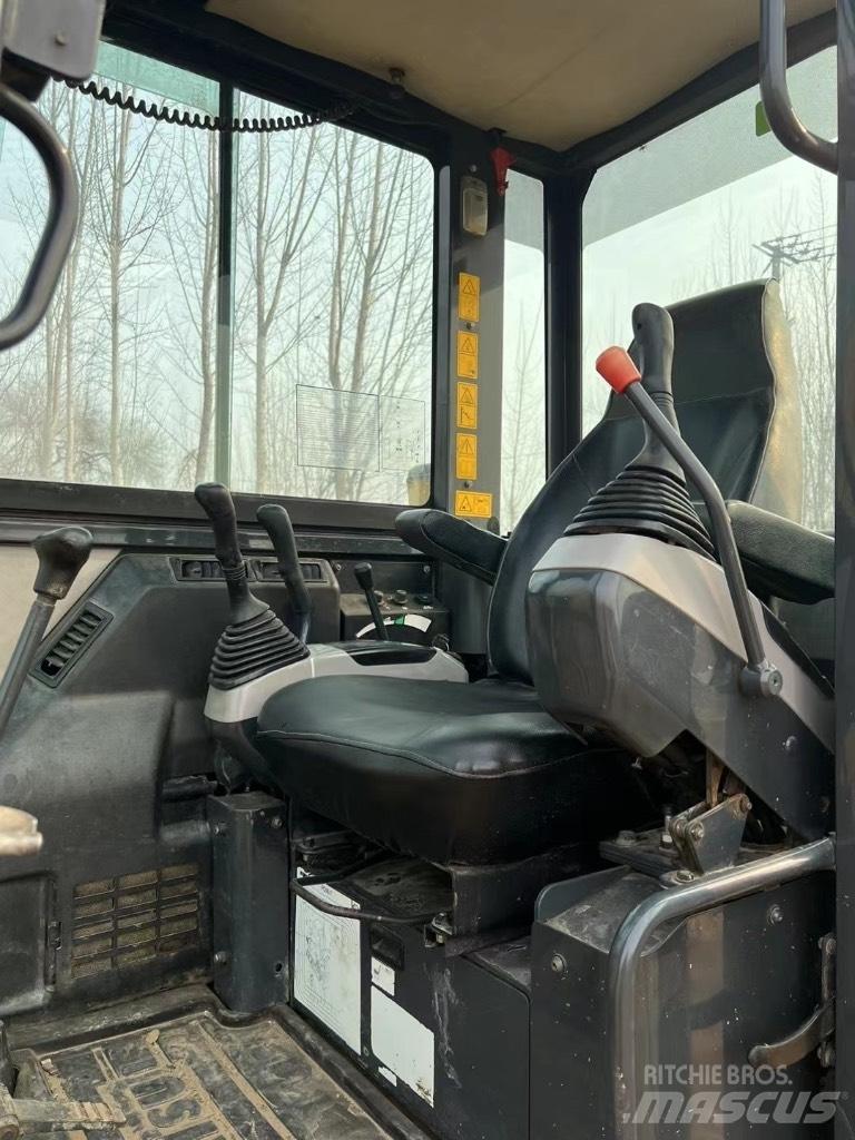 Komatsu PC58 Közepes (midi) kotrók 7 t - 12 t