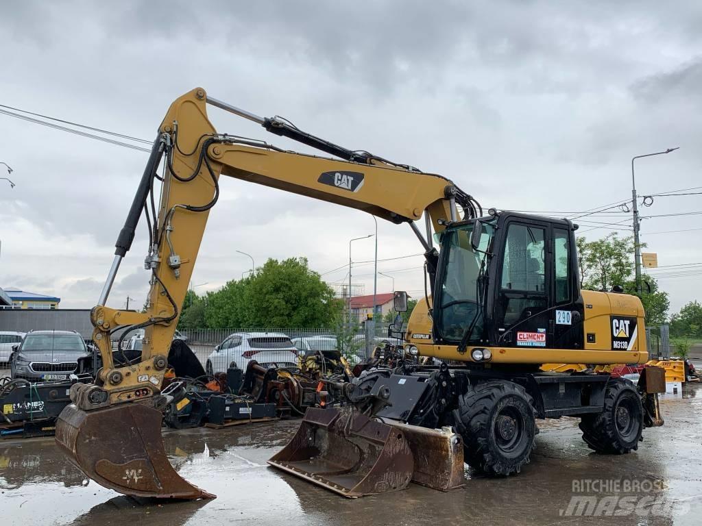 CAT M 313 D Gumikerekes kotrók