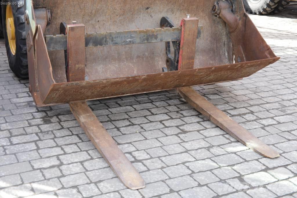 CAT 906M Gumikerekes homlokrakodók