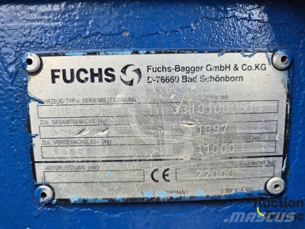 Fuchs MHL 331 Gumikerekes kotrók