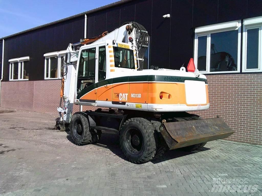 CAT M313D Gumikerekes kotrók