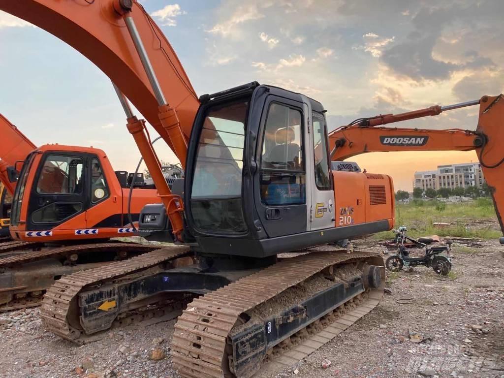 Hitachi ZX 210 Lánctalpas kotrók