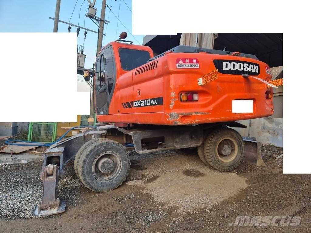 Doosan DX210W Gumikerekes kotrók
