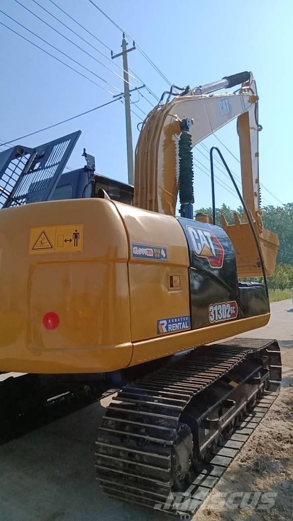 CAT 313 D Gumikerekes kotrók