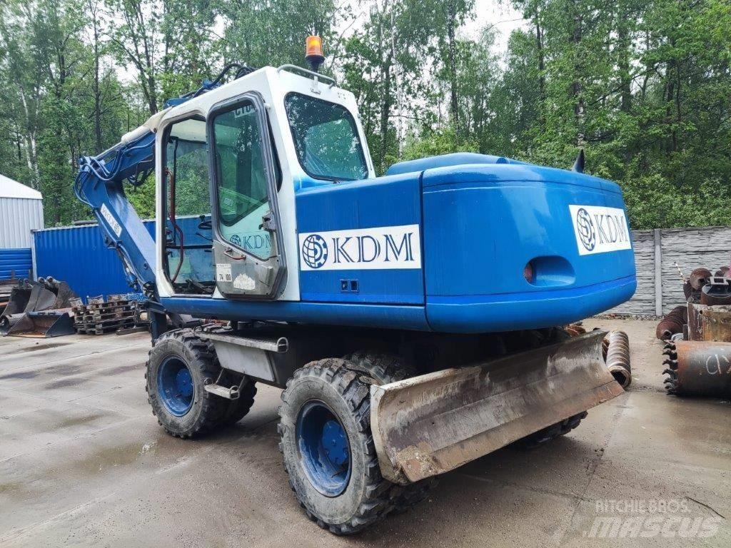 Atlas 1404 Gumikerekes kotrók