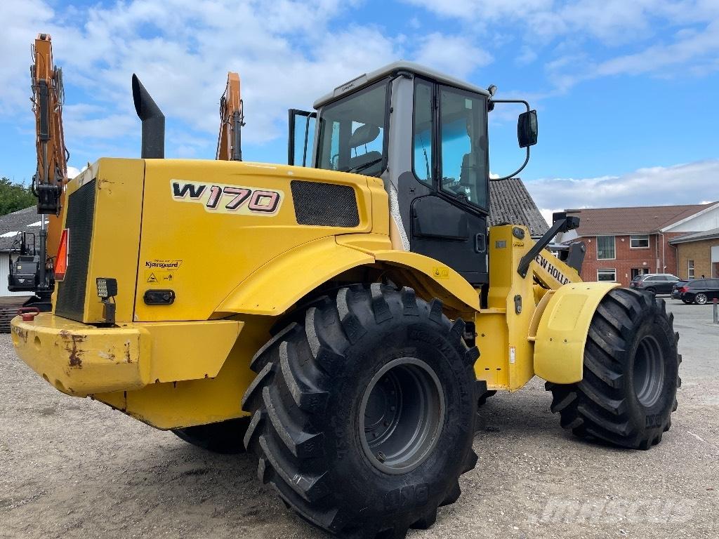 New Holland W 170 Gumikerekes homlokrakodók