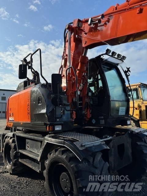 Hitachi ZX 140 W-6 Gumikerekes kotrók