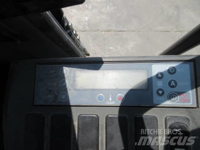 New Holland E 245 Lánctalpas kotrók
